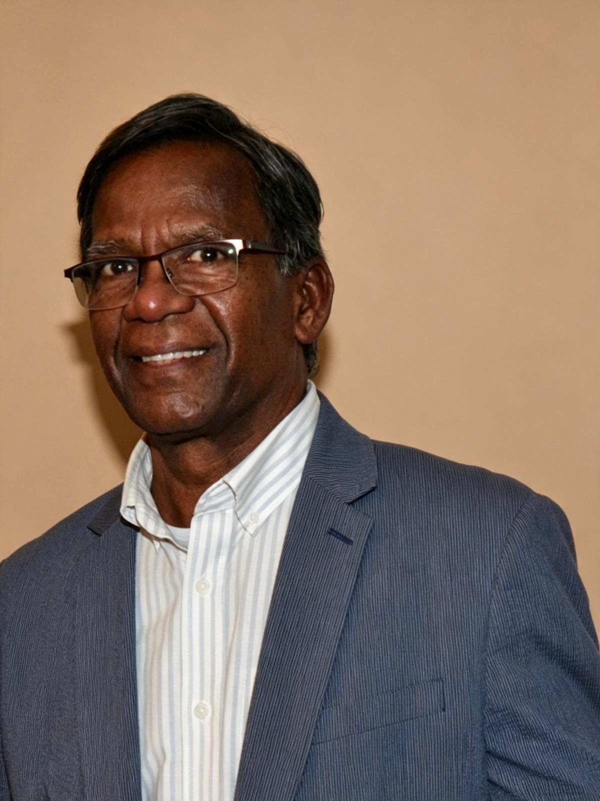 Mr. E. Thevarajah